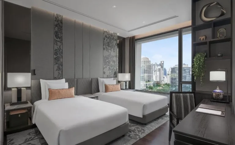Twin room with city view at Sindhorn Kempinski Hotel Bangkok