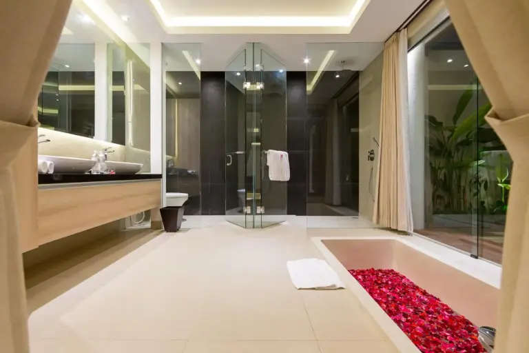 Sithala Villa Seminyak luxurious bathroom with flower petals