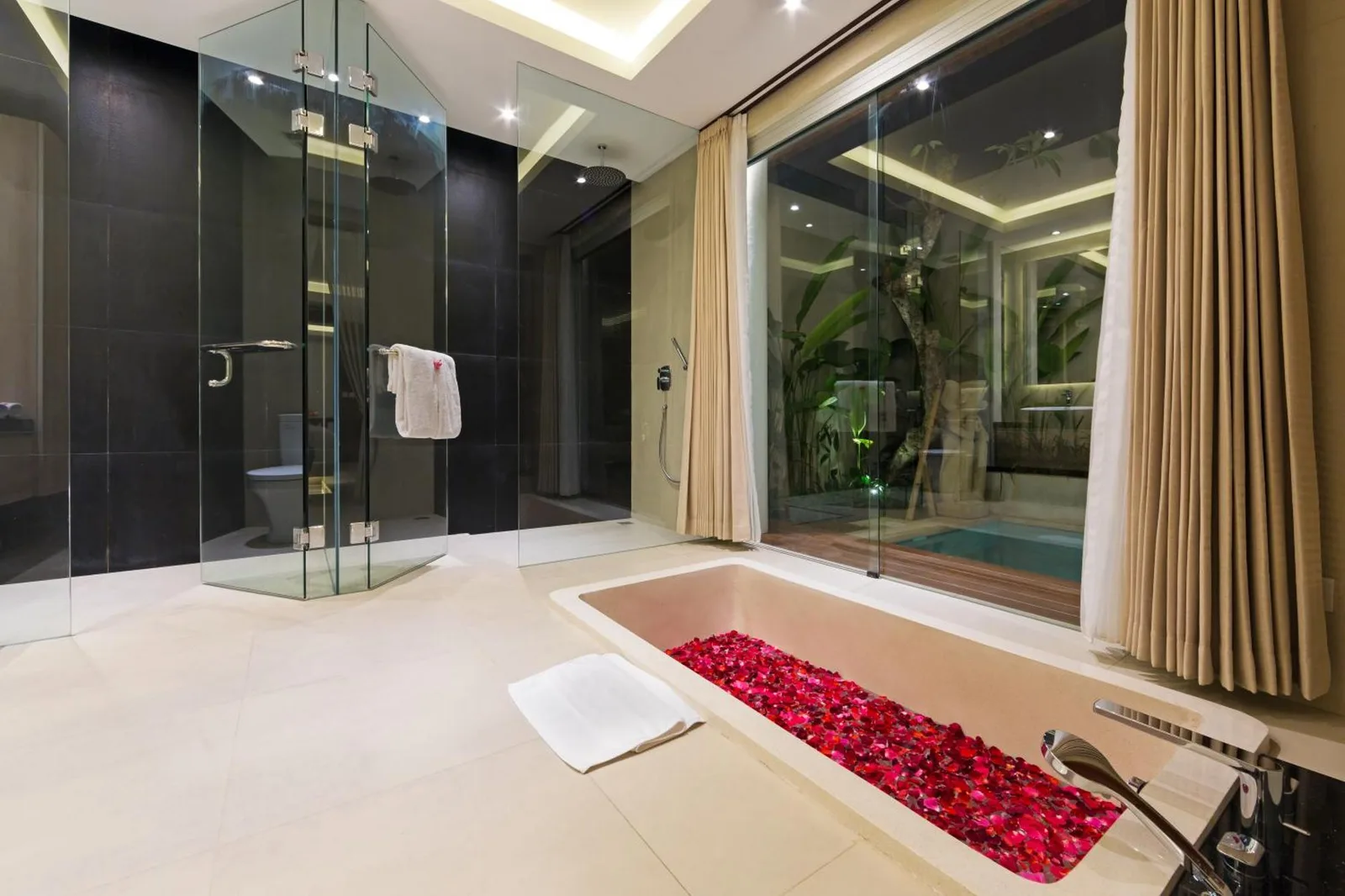 Sithala Villa Seminyak modern bathroom with glass shower