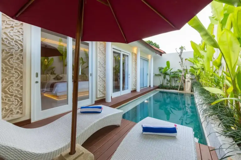 Sithala Villa Seminyak private pool area with lounging chairs