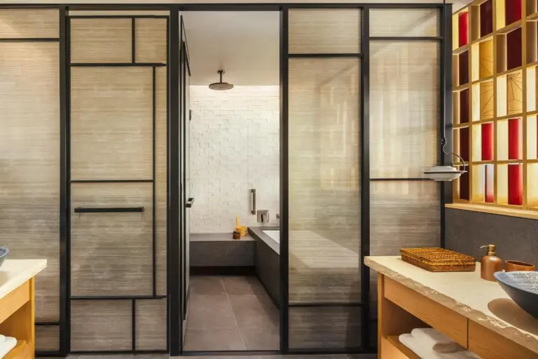 Stylish bathroom at Six Senses Kyoto with glass partitions