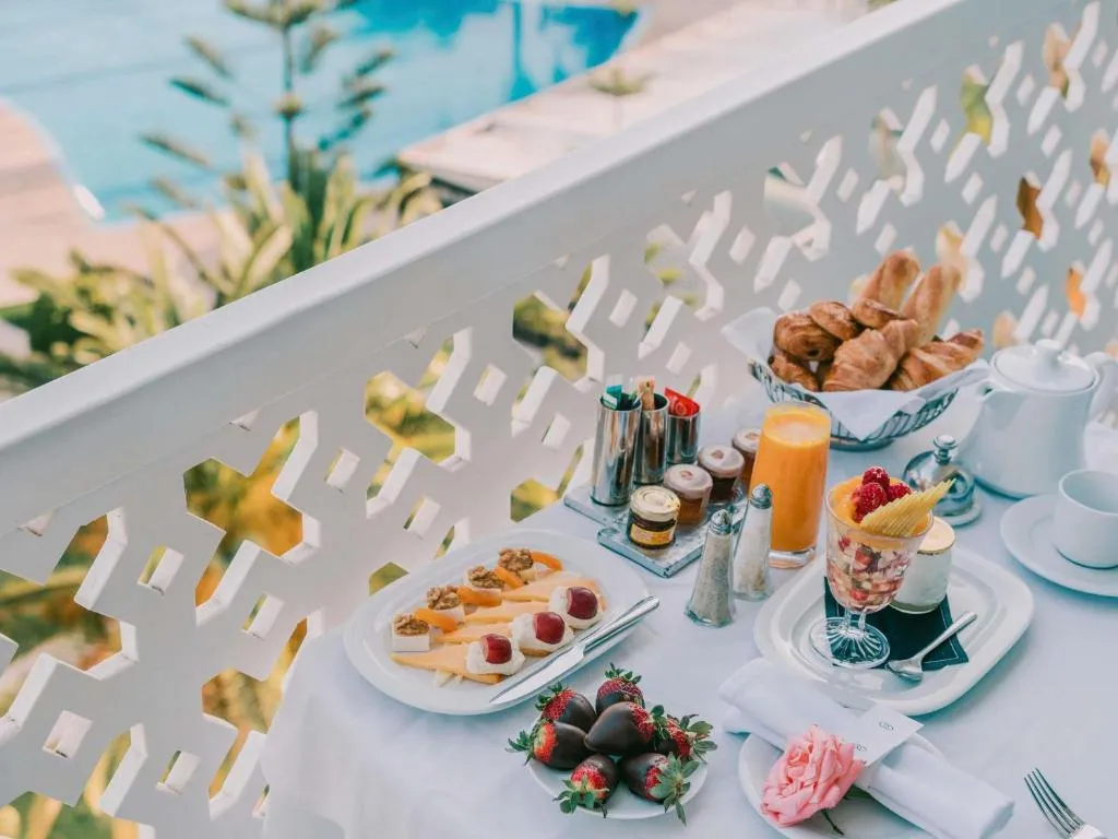 Breakfast spread at Sofitel Rabat Jardin Des Roses overlooking the pool