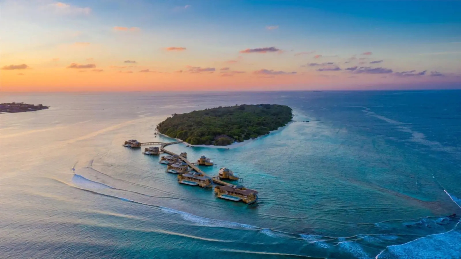 Aerial view of Soneva Fushi in Baa Atoll showcasing the stunning islands and ocean.