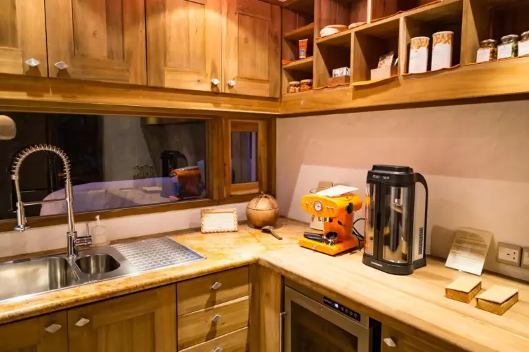 Well-equipped kitchen area in a villa at Soneva Fushi.