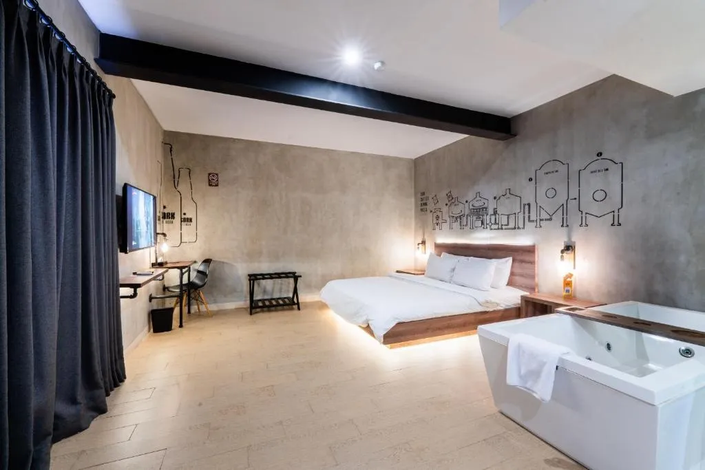 Stylish guest room with jacuzzi at Stark Boutique Hotel and Spa in Bali