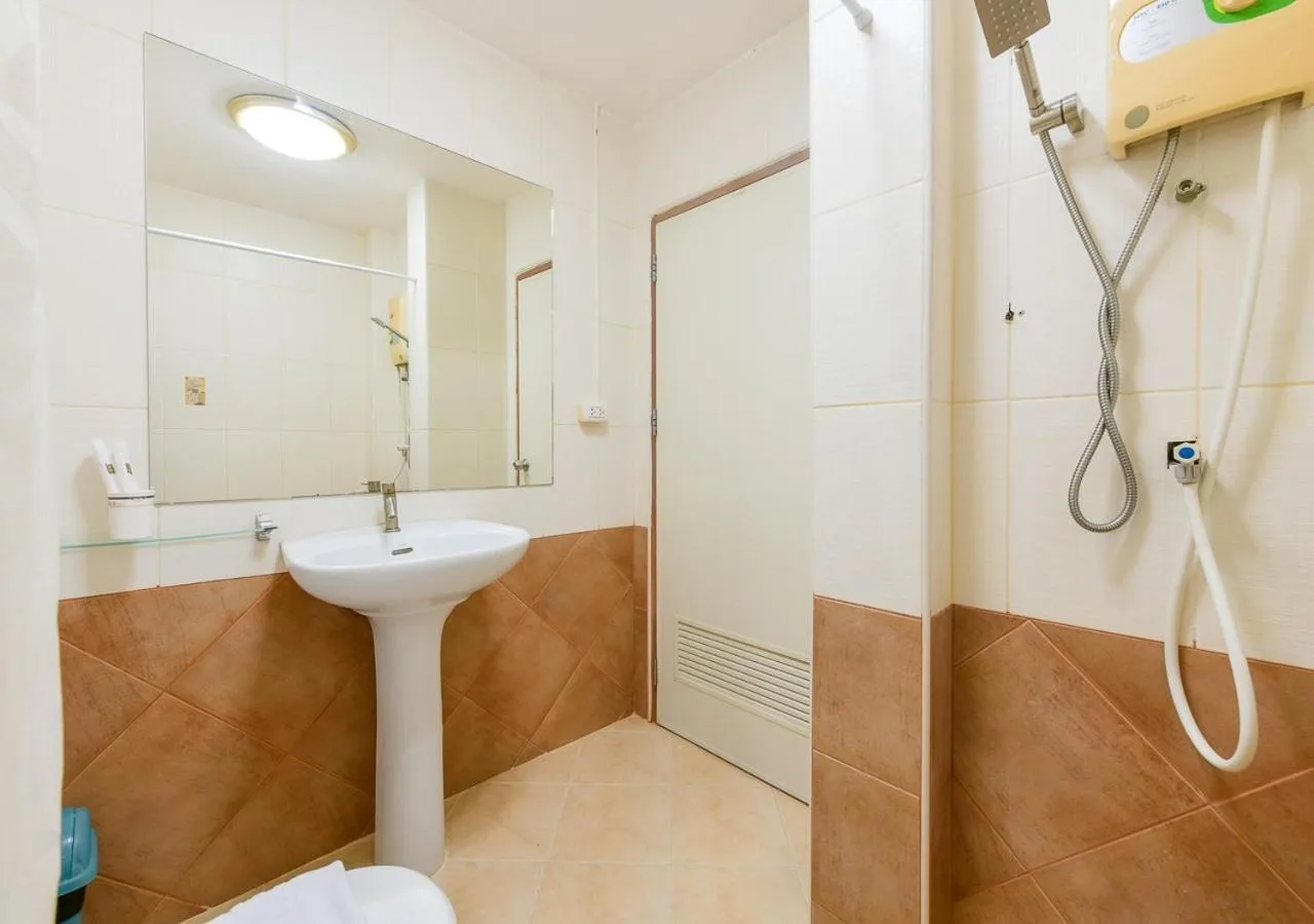 Sun & Beach Pattaya bathroom sink area with pedestal basin and shower