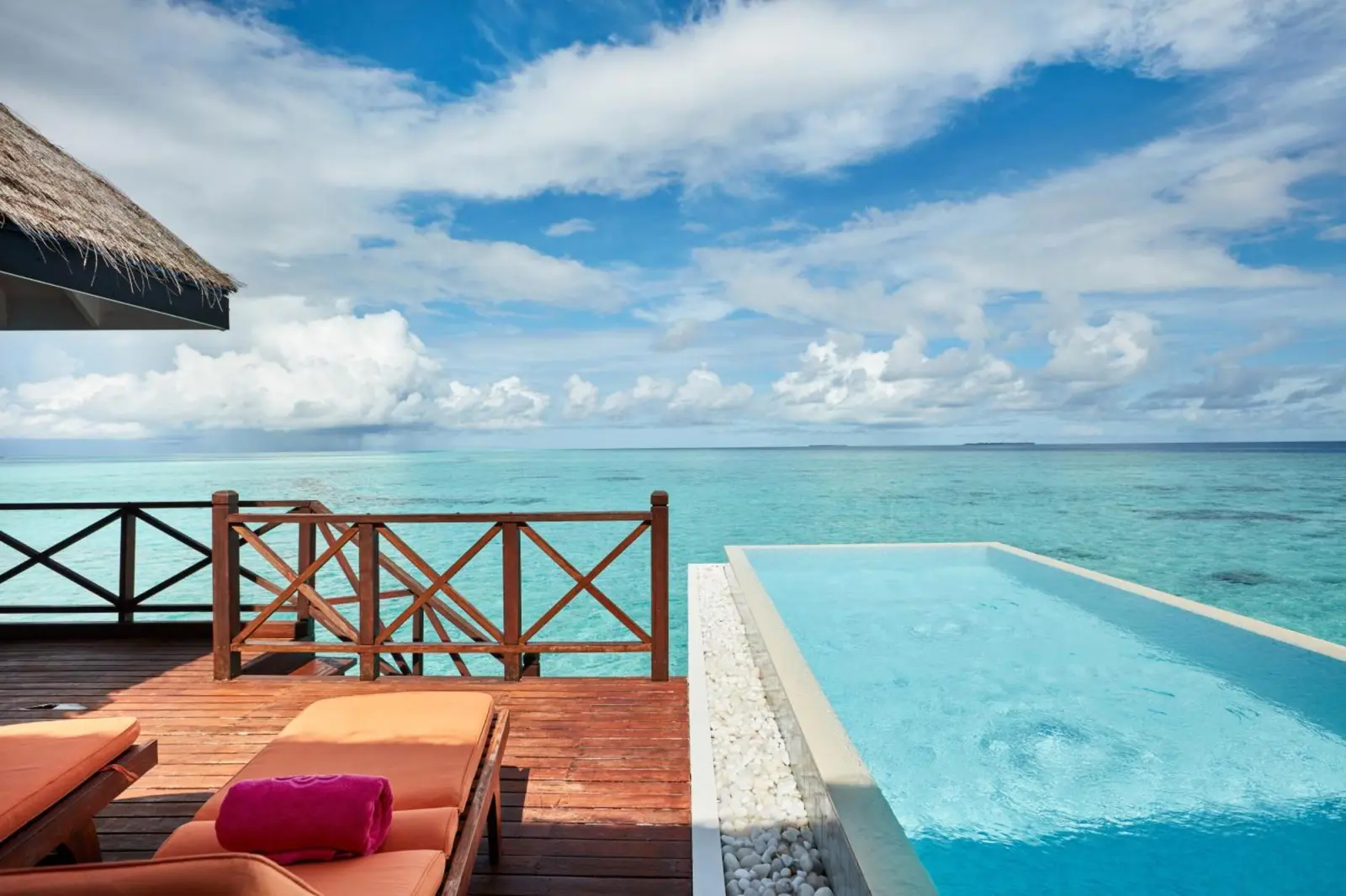 Infinity pool next to villa at Sun Siyam Vilu Reef