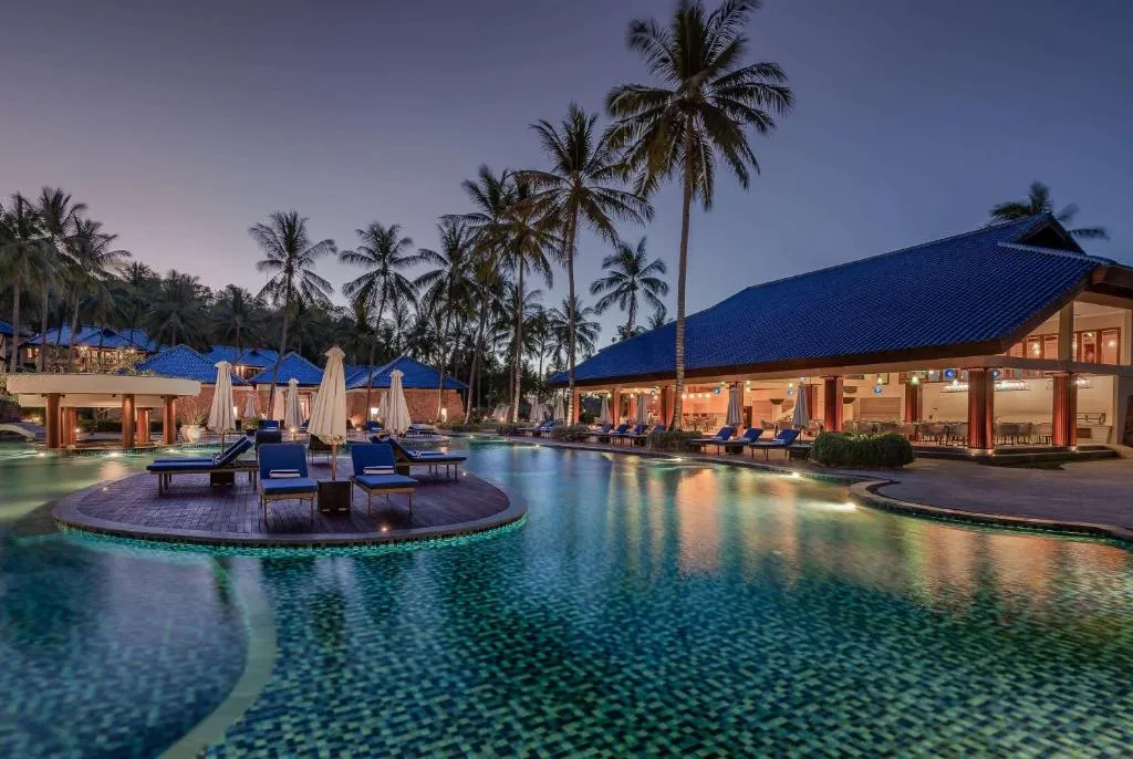 Sundancer Residences and Villas Lombok pool area at sunset