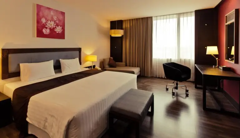 Sunee Grand Hotel and Convention Center deluxe room interior.