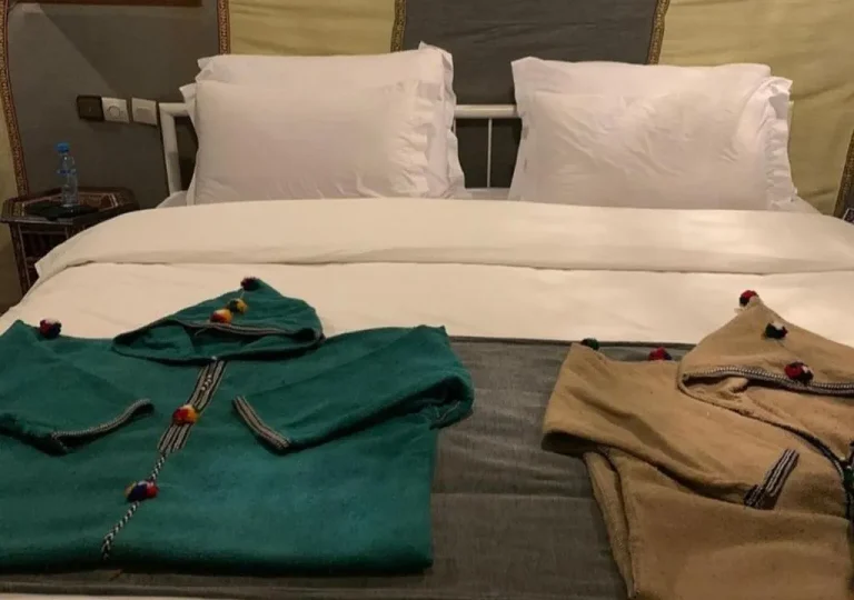Sunny Luxury Camp traditional kaftans in Merzouga