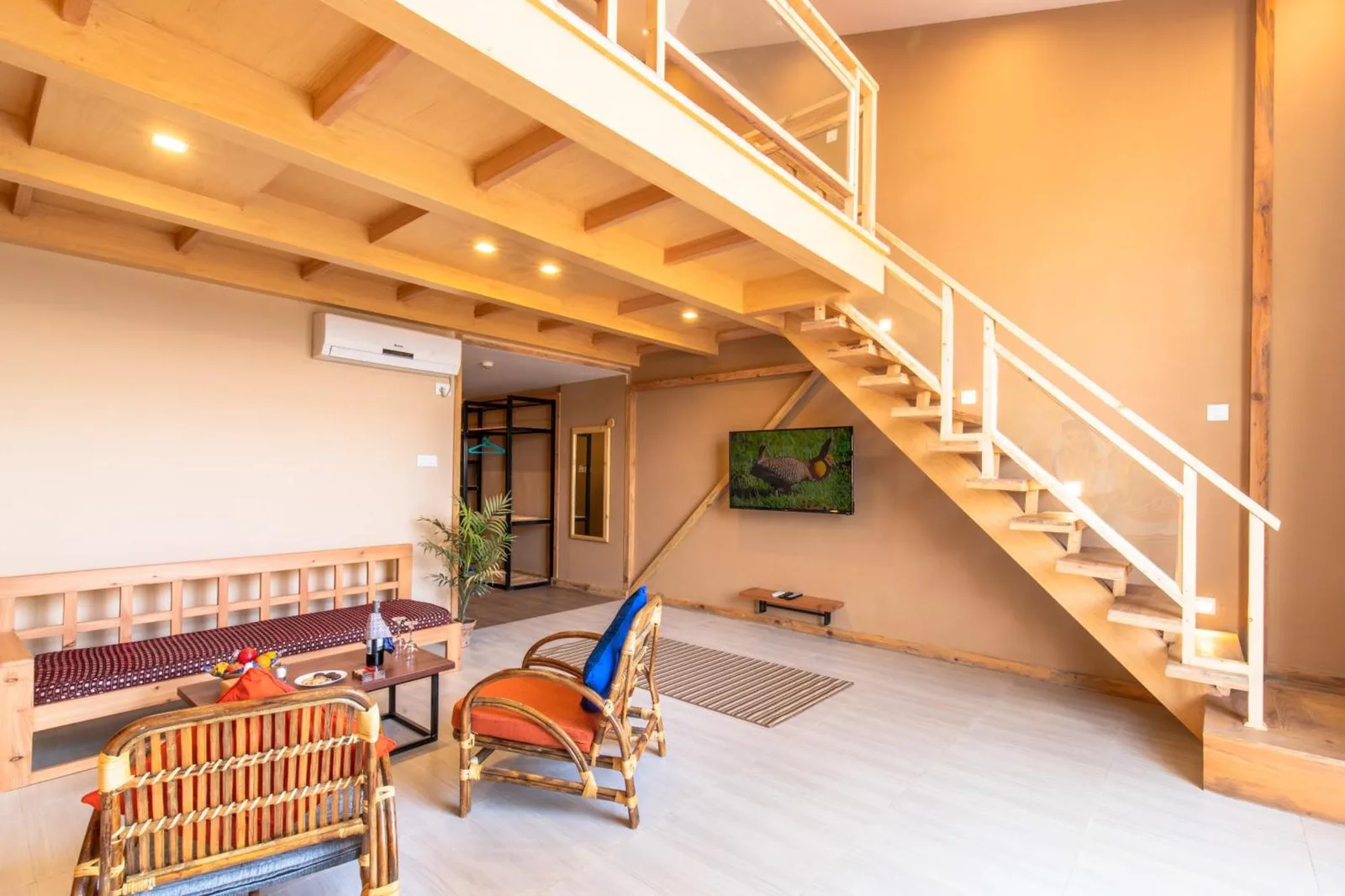 Sunshine Resort Pokhara – Pokhara, Nepal hotel – a room with a bunk bed and a staircase at Sunshine Resort Pokhara in Pokhara