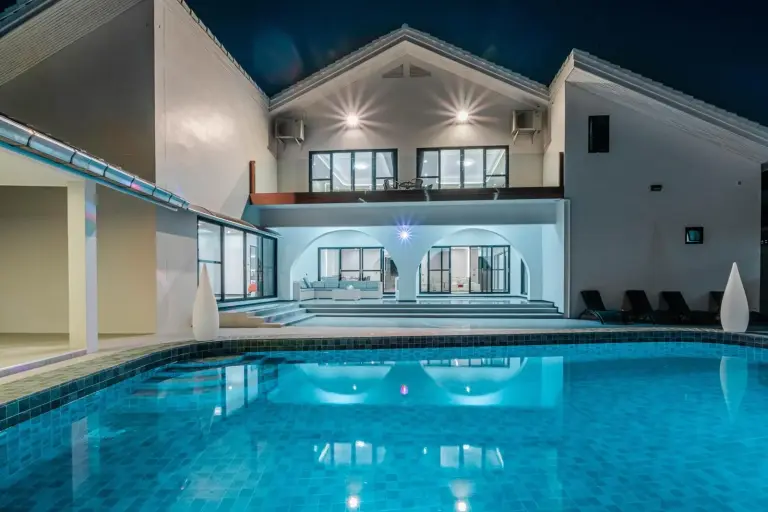 Swimming pool at night in T M L-Grand Manor