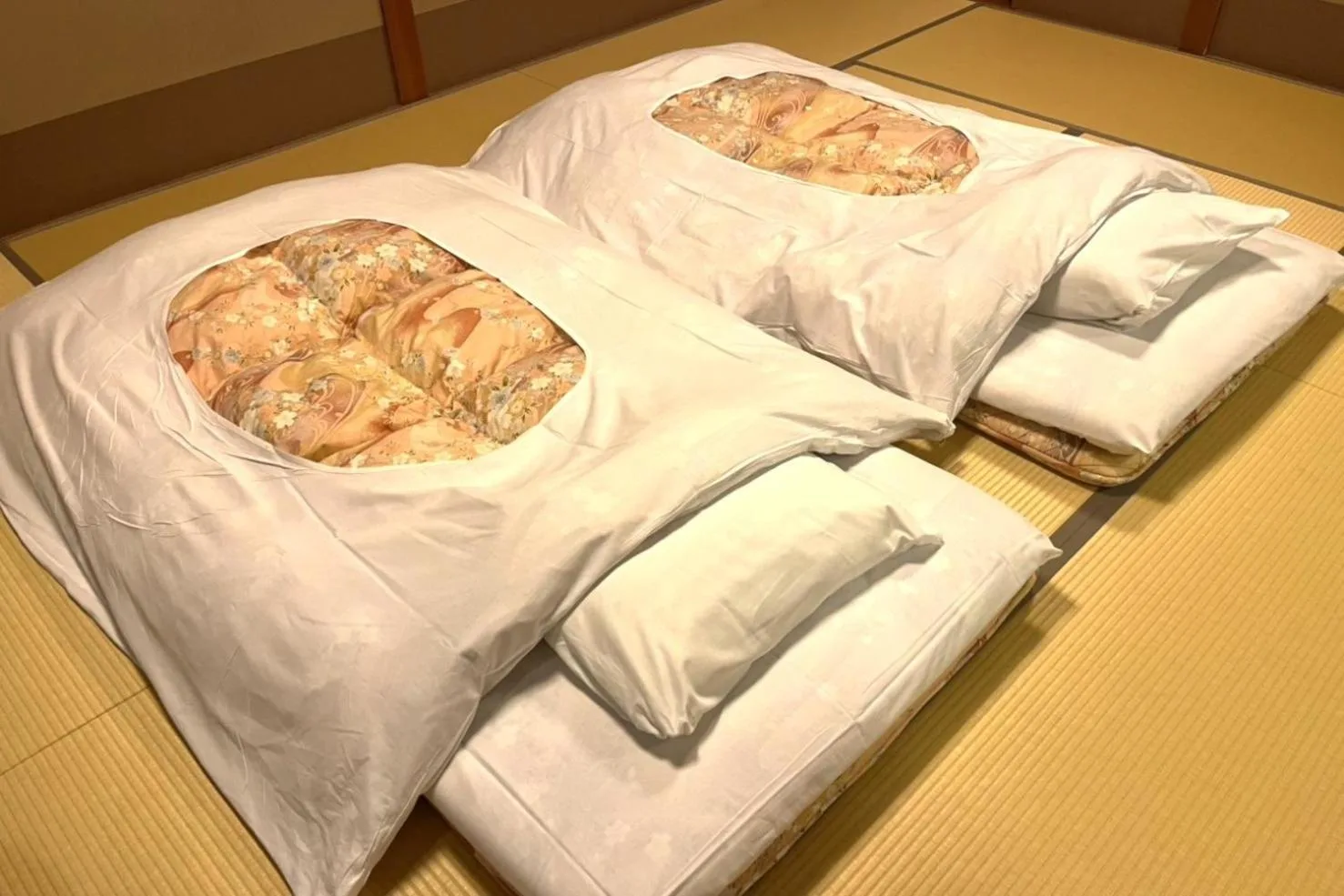 TAKITEI Riverside Onsen futons set up