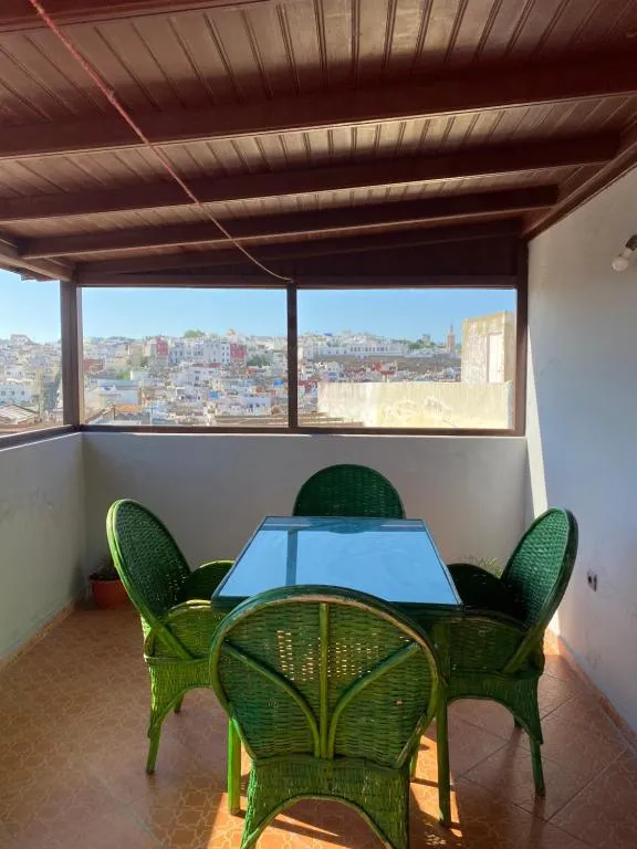 Seating area on rooftop at TANJALUCIA HOSTeL in Tangier