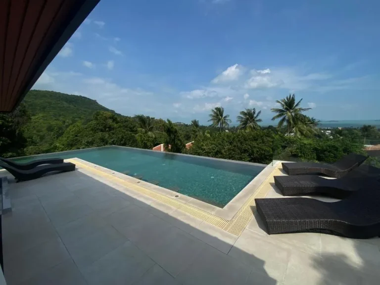 Sun loungers by the pool at The Akbar Villa, Koh Samui