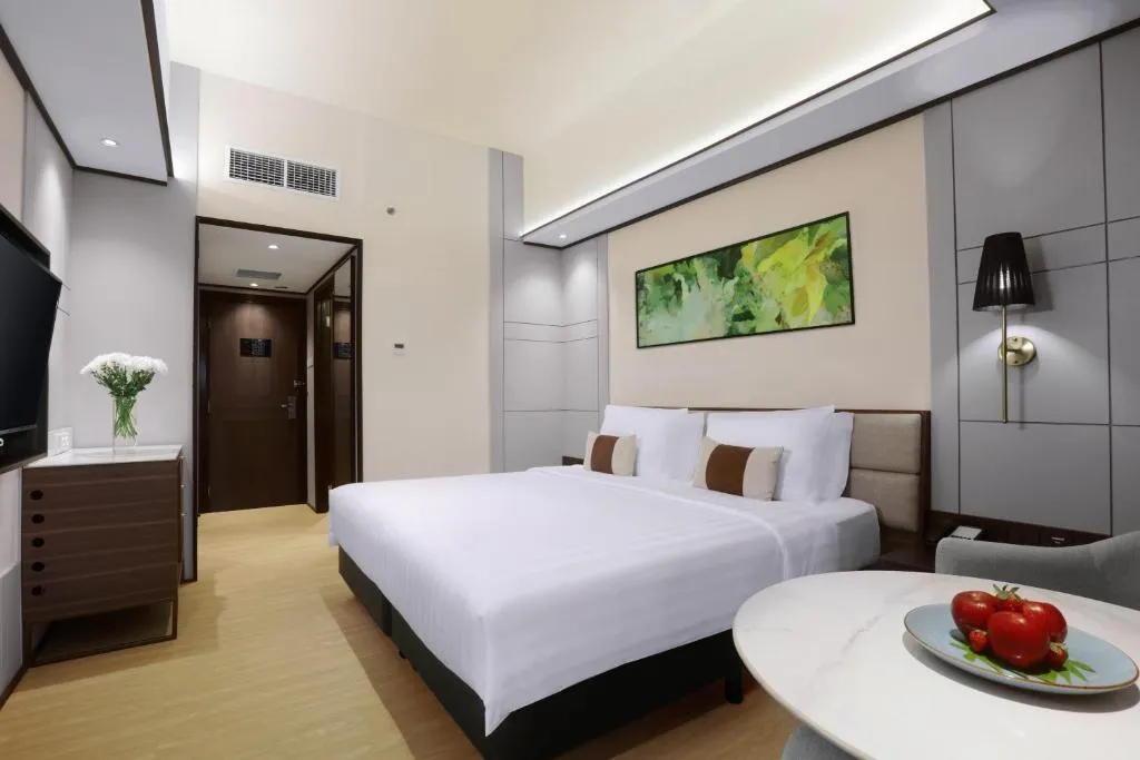 Interior of a deluxe room at The Alts Hotel in Palembang