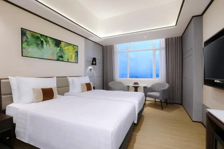 Interior of a twin room at The Alts Hotel in Palembang
