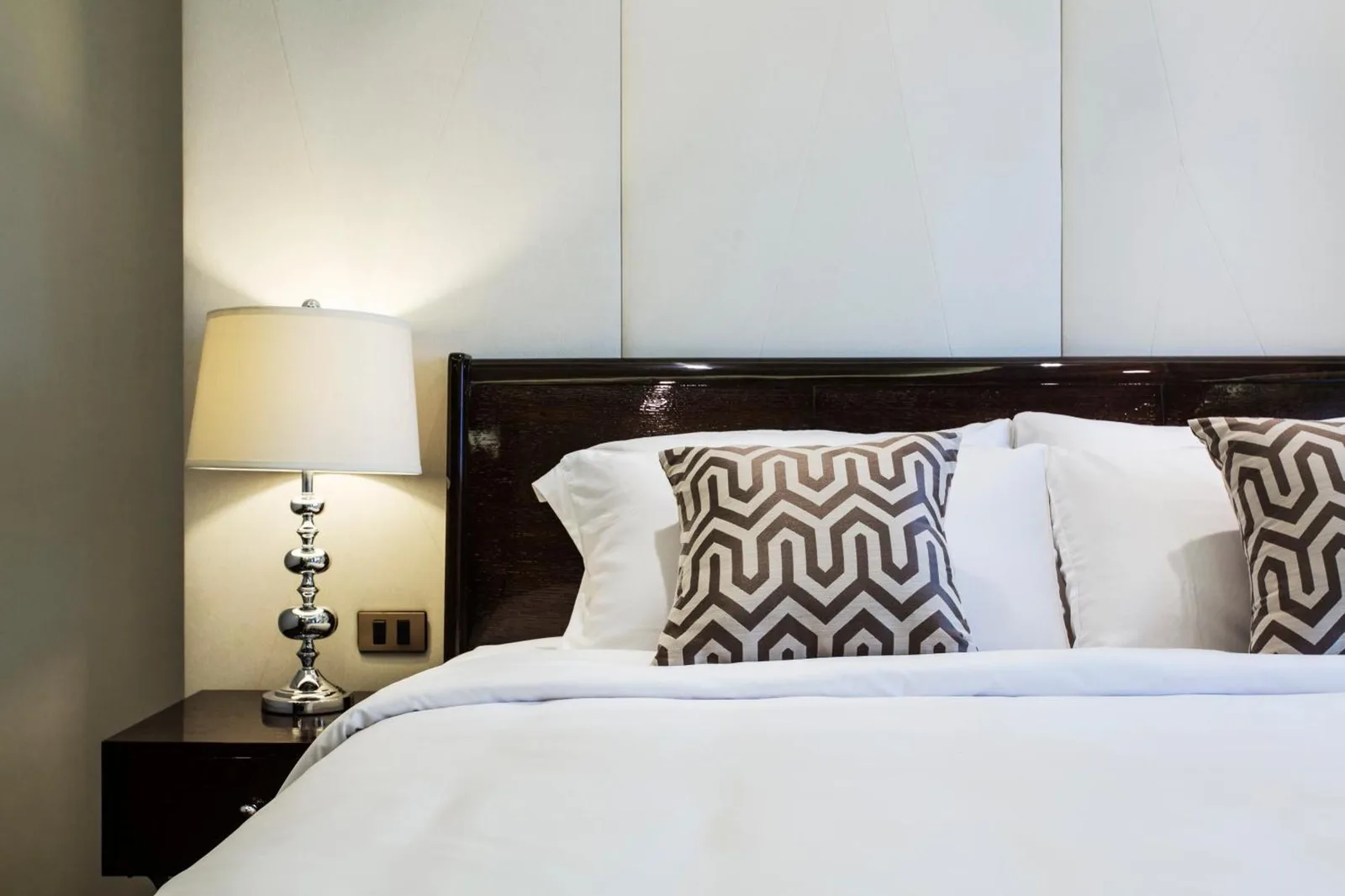 Close-up of bed in The Chiang Mai Riverside hotel