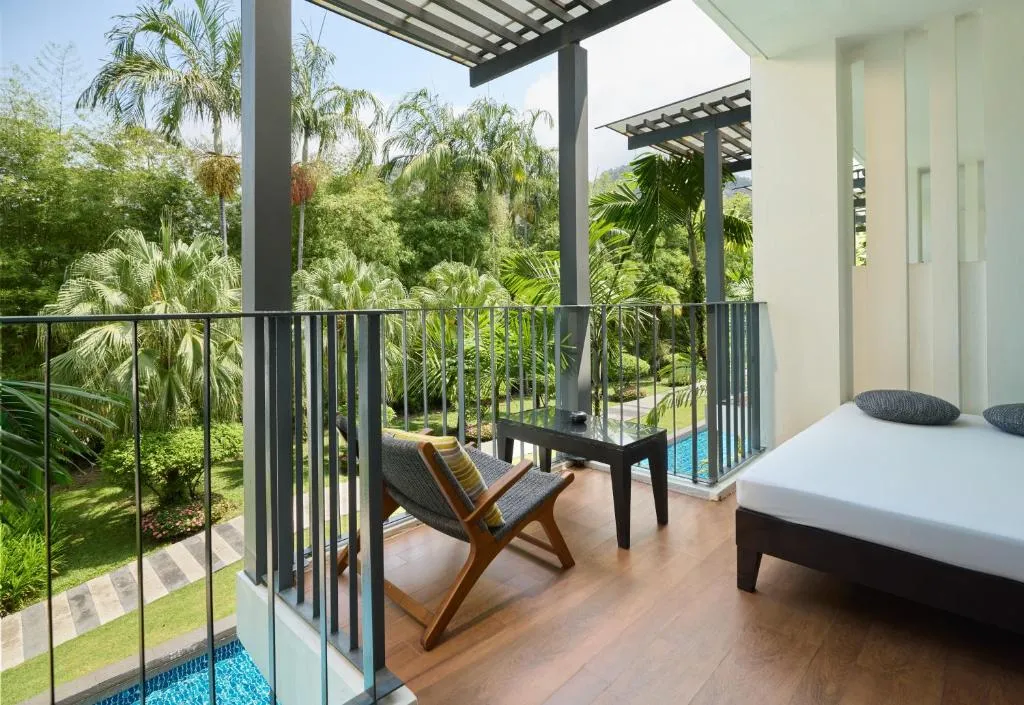 Serene balcony view at The Chill Resort and Spa, Koh Chang overlooking the gardens.