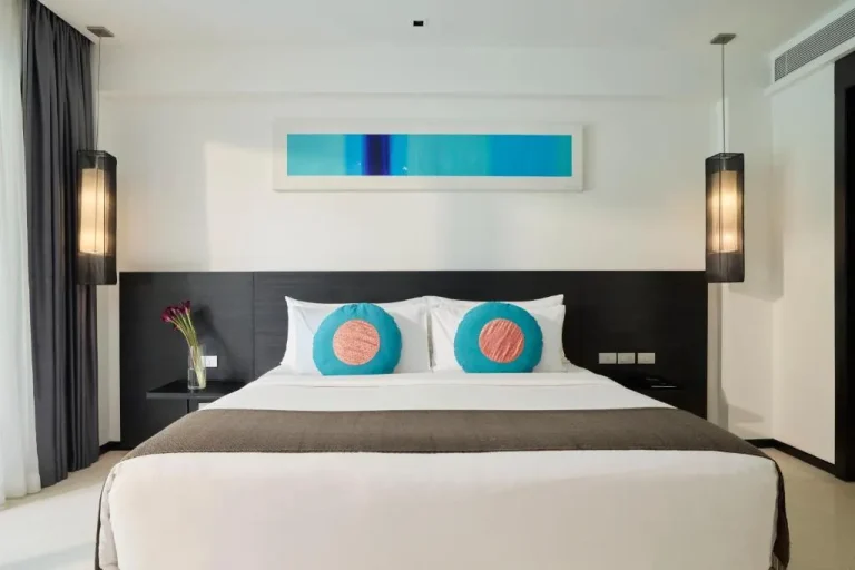 Stylish bedroom at The Chill Resort and Spa, Koh Chang with artistic decor.