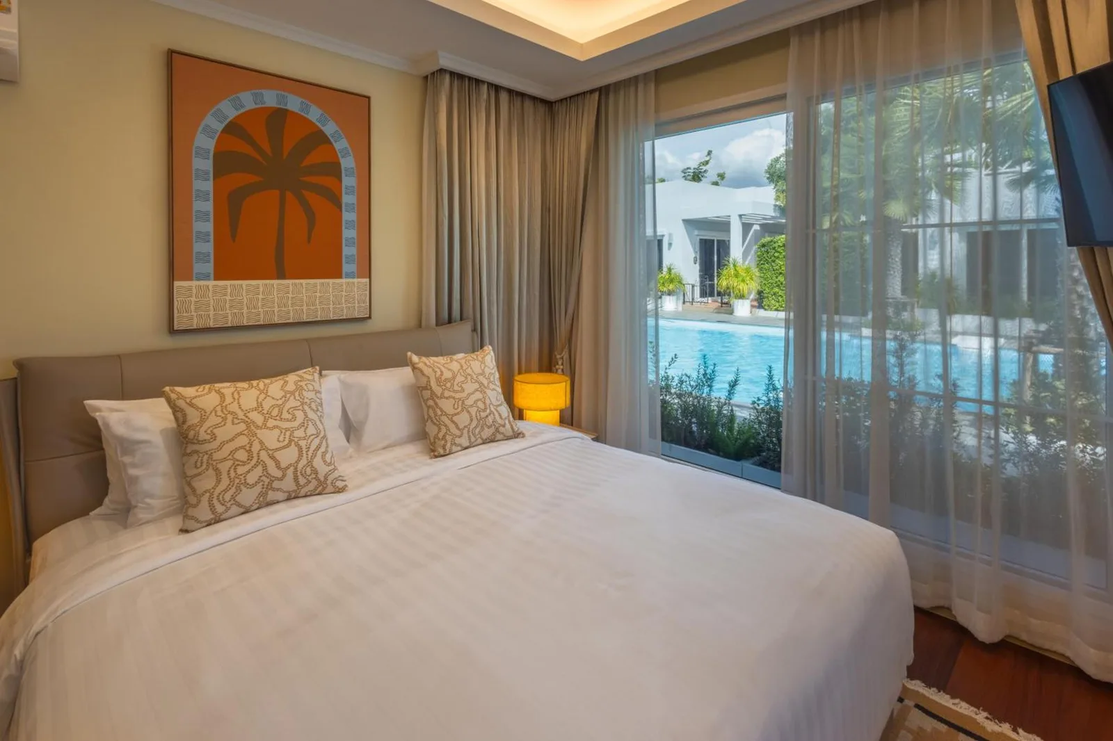 Bedroom with pool view at The Delfini Hua Hin