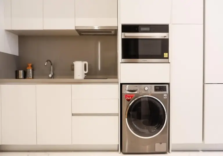 Laundry and kitchen area at The Grand Mansion Menteng