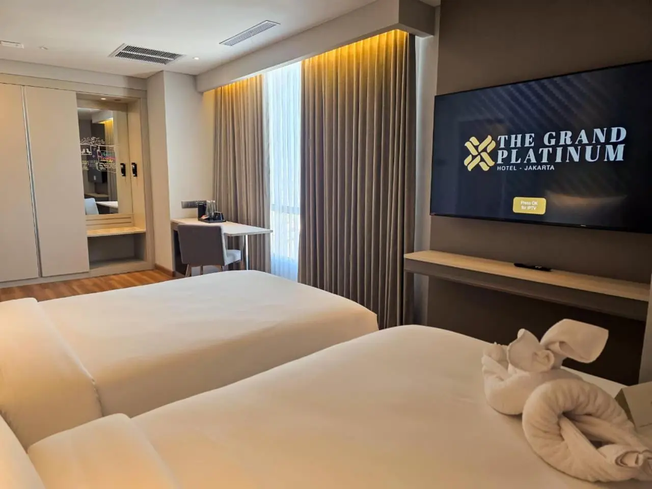 Chambre Double avec des équipements modernes au The Grand Platinum Jakarta