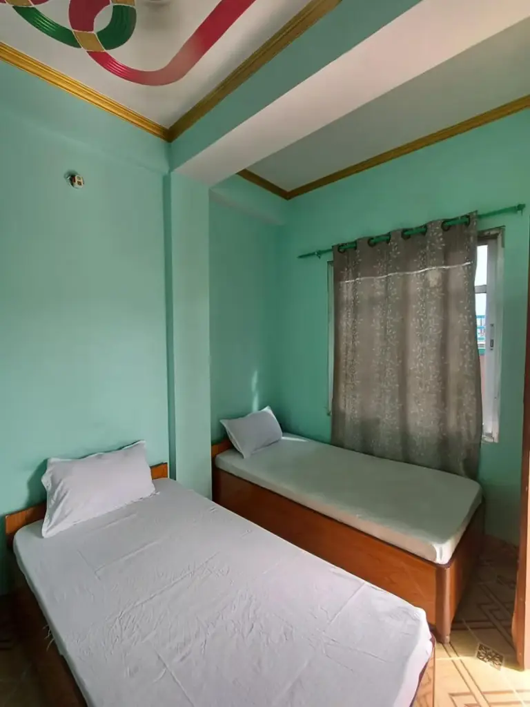 Ein komfortables Zweibettzimmer im The Green Plaza Lodge in Dhangadhi