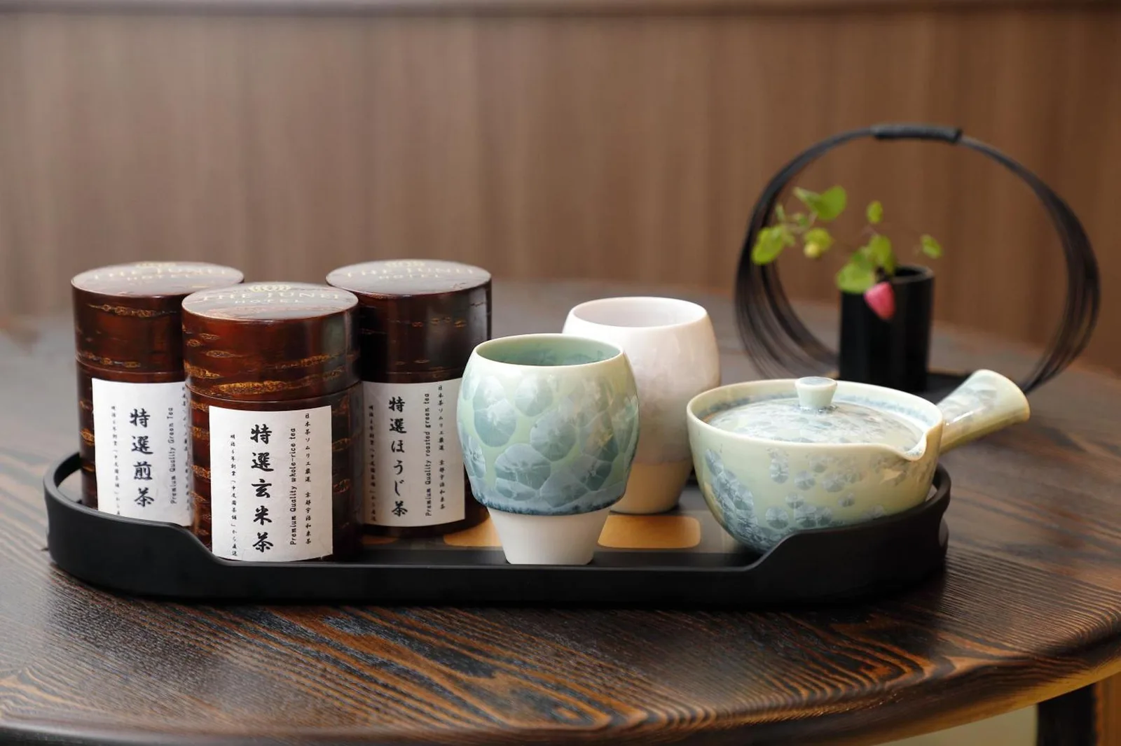 THE JUNEI HOTEL Kyoto Imperial Palace West – Kyoto, Japan hotel – a tray with bowls and cups on a table at THE JUNEI HOTEL Kyoto Imperial Palace West in Kyoto