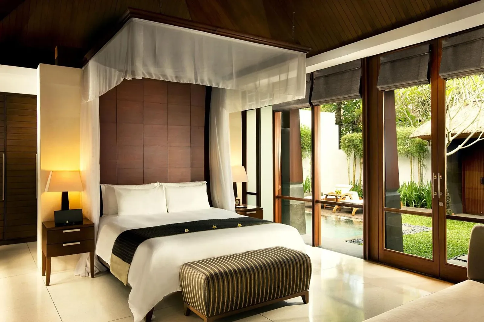 The Kayana Seminyak deluxe bedroom with a view