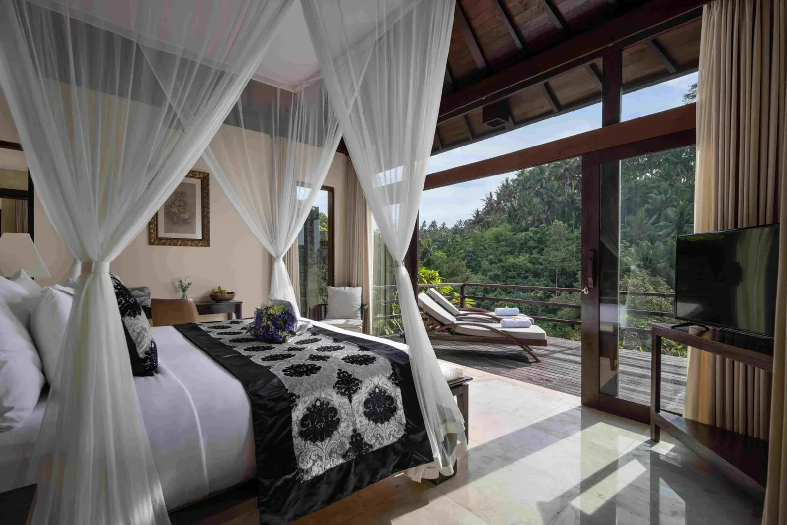 Another view of a luxury room in The Kayon Valley Resort with balcony