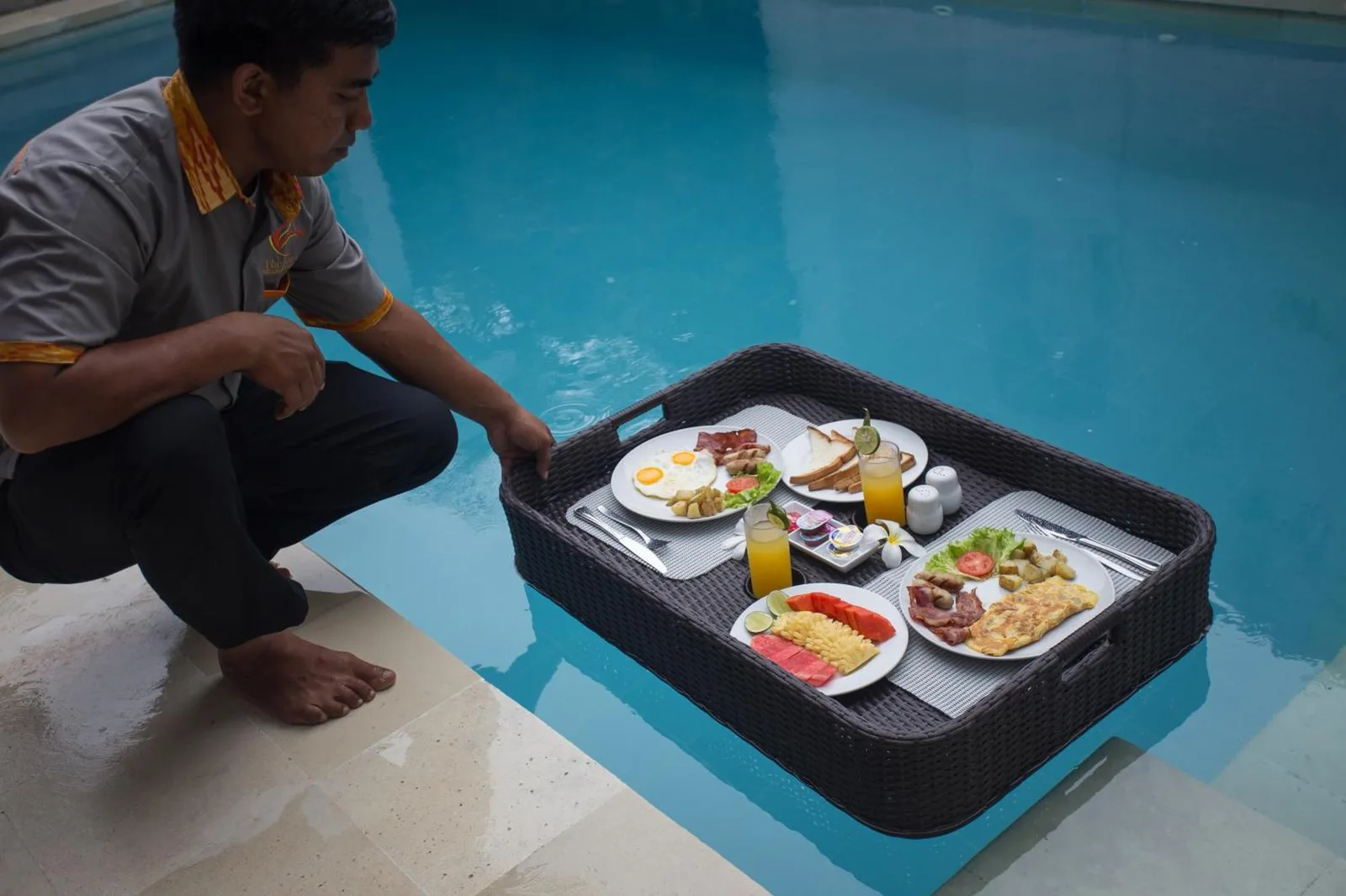 Poolside dining experience at The Kon's Villa Bali Seminyak