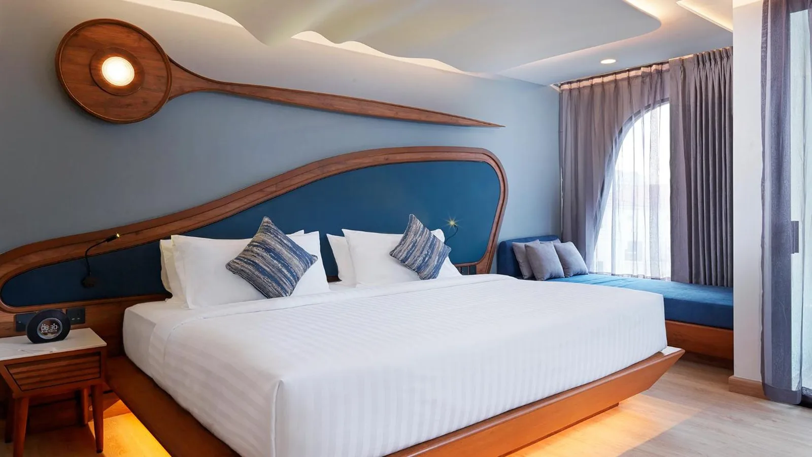 King bed suite interior at The Oceanic Sportel Phuket - SHA Extra Plus in Phuket