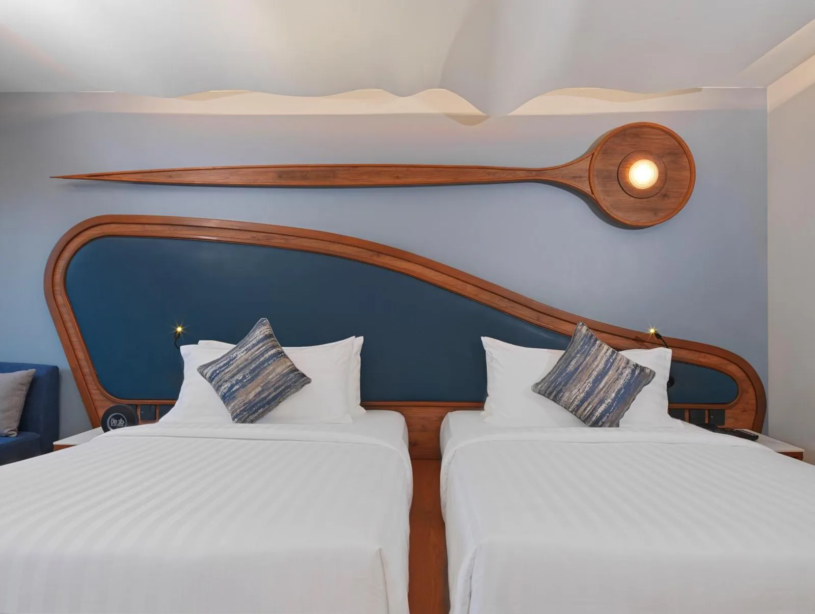 Twin beds in a guest room at The Oceanic Sportel Phuket - SHA Extra Plus Phuket