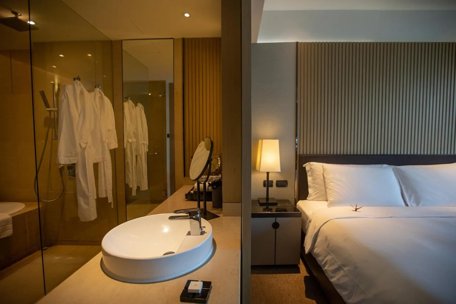 Bathroom and bedroom area in The Okura Prestige Bangkok