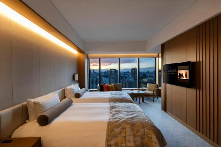 Twin bedroom with city view at The Okura Tokyo