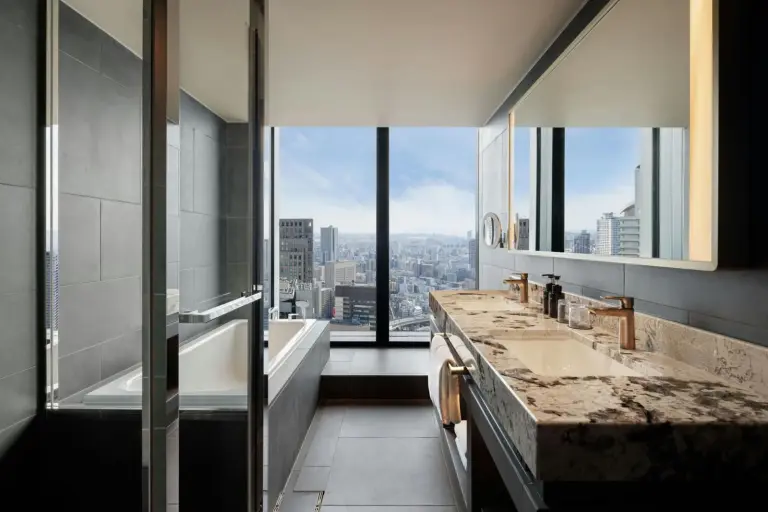 Bathroom with view at The Osaka Station Hotel