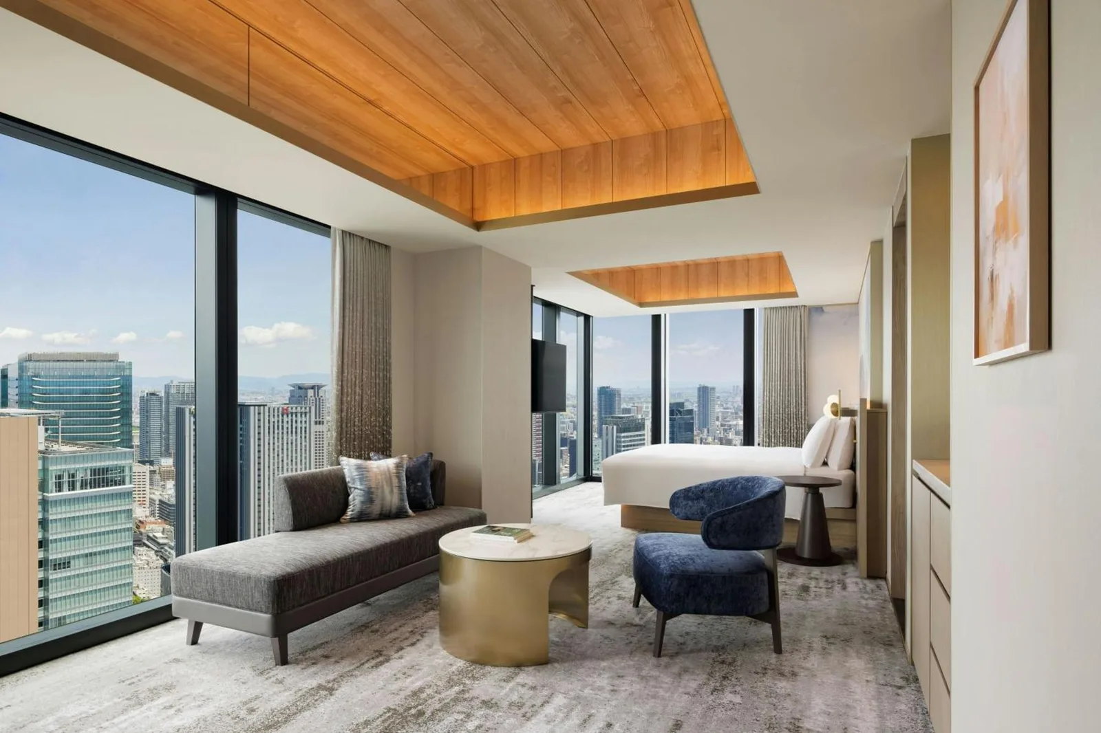 Suite bedroom with view at The Osaka Station Hotel