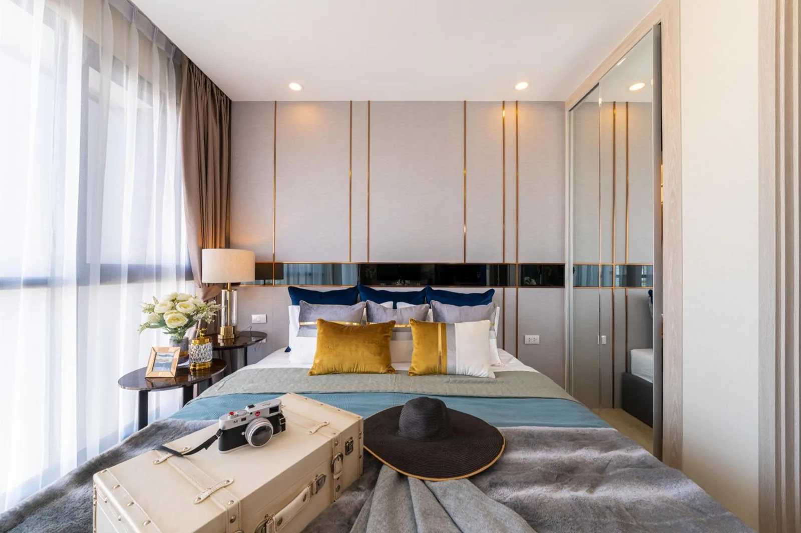 Bedroom view at The Panora Pattaya by PH with bed, balcony light, and modern wall design in Pattaya