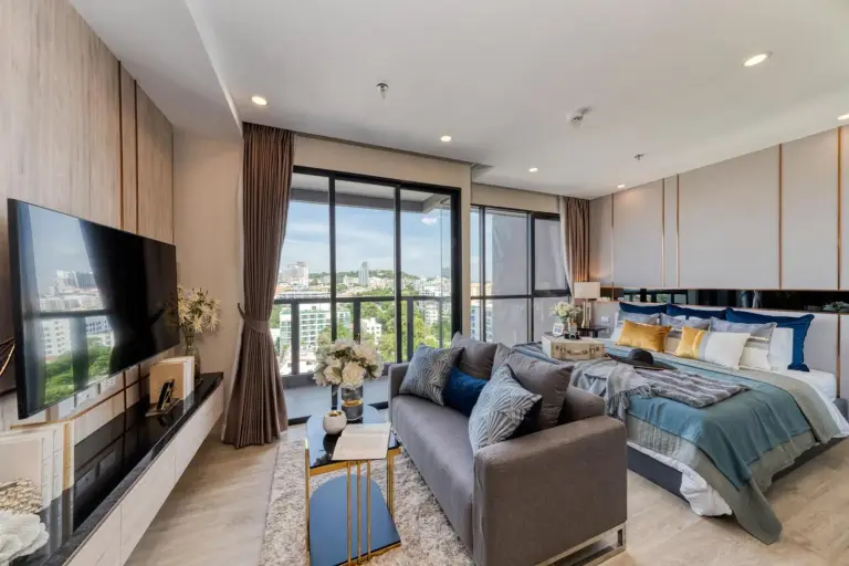 City view suite at The Panora Pattaya by PH with balcony windows and modern living area in Pattaya