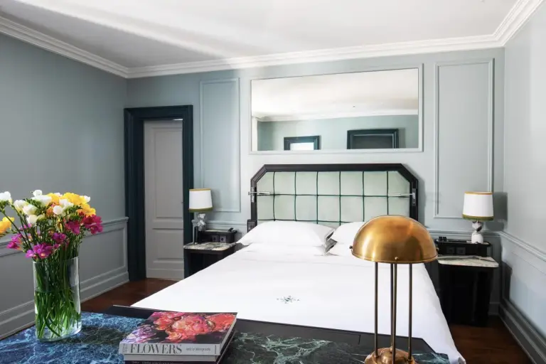 Stylish bedroom with floral decor at The Place Firenze hotel