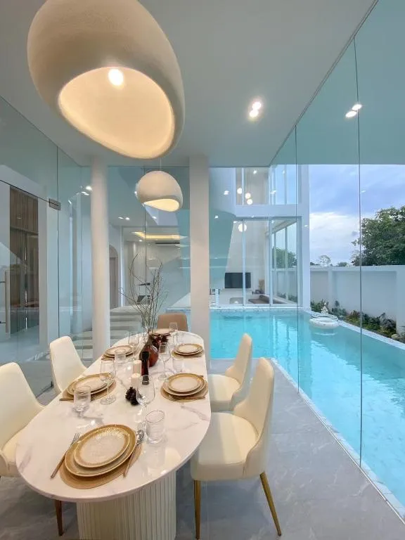 Dining table set in The Pool Space - ICONIC Pool Villa, Pattaya