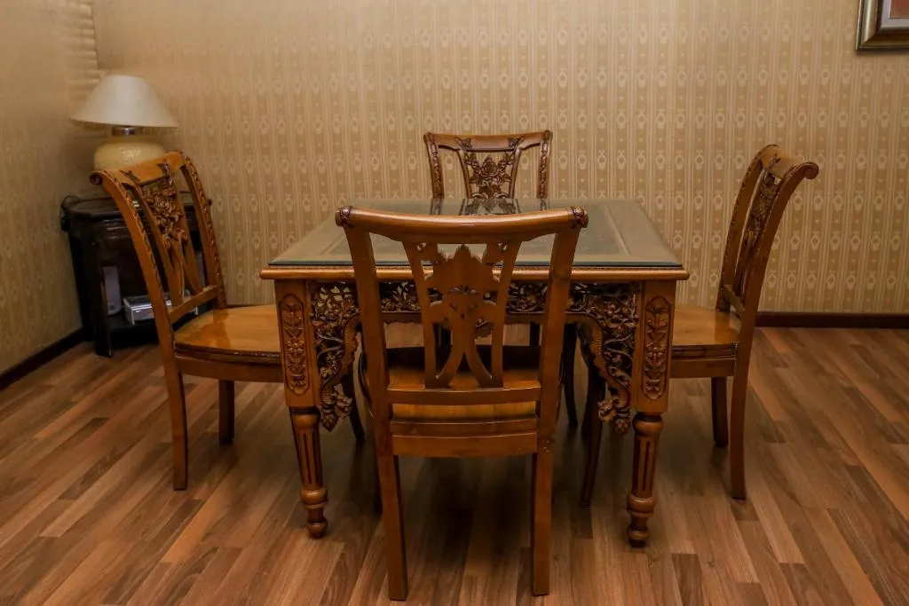 The Red House Marrakech wooden dining table and chairs