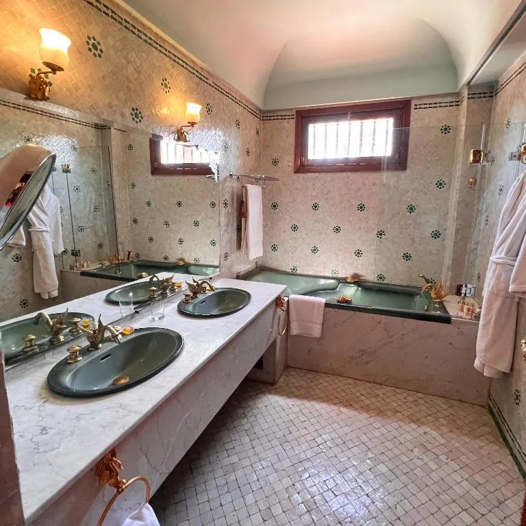 The Red House Marrakech spacious bathroom with modern amenities