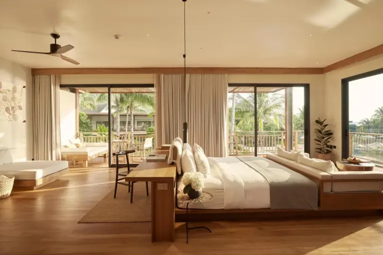 A spacious suite at The Retreat Koh Chang, an SLH Hotel, filled with natural light and modern design.