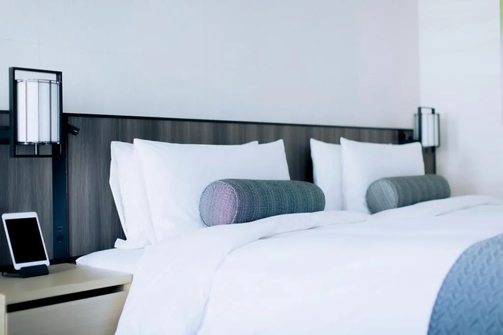 Close-up of bedding in a room at THE THOUSAND KYOTO hotel