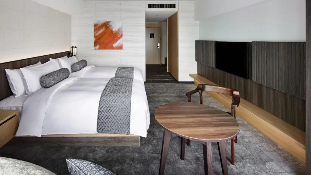 Stylish interior of a guest room at THE THOUSAND KYOTO hotel