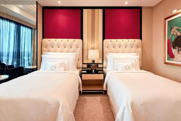 Comfortable twin room at The Trans Luxury Hotel Surabaya