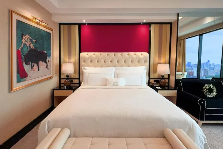 Elegant accommodation in a bedroom at The Trans Luxury Hotel Surabaya