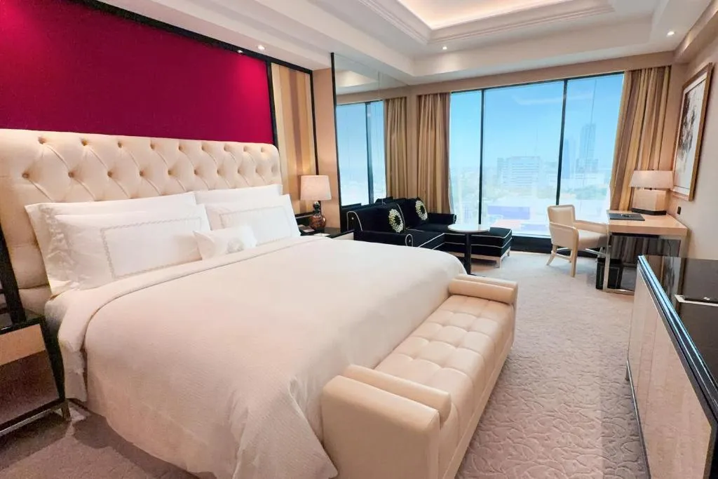 Luxury bedroom at The Trans Luxury Hotel Surabaya with elegant decor